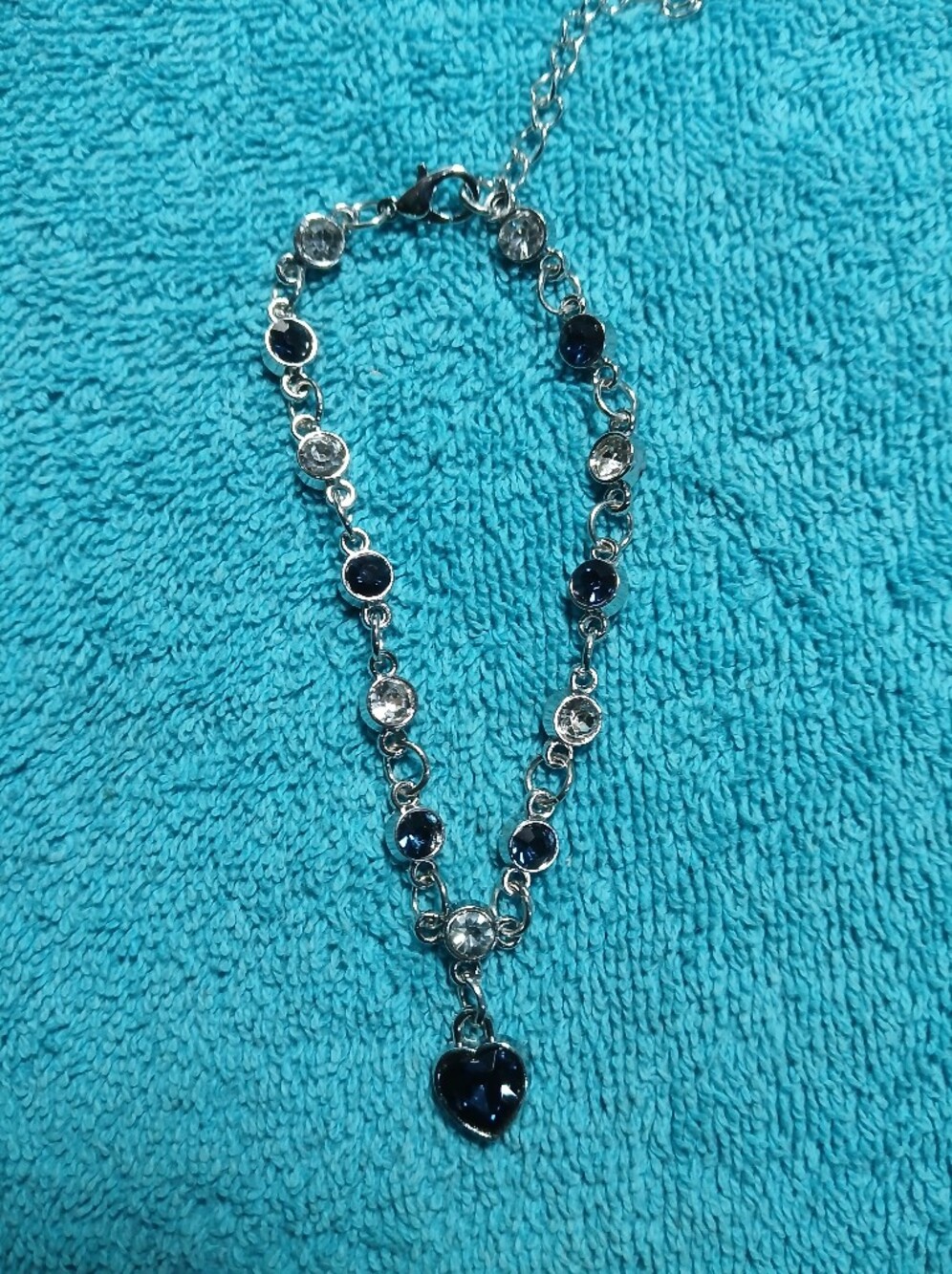 Silver Tone Bracelet with Blue and Clear Crystals and Heart Pendant